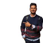 smiling-happy-indian-student-with-backpack-pointing-his-finger-wall